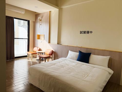 Una cama o camas en una habitación de RiRi B&B