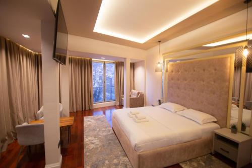 Katil atau katil-katil dalam bilik di Secret Hotel,Korce