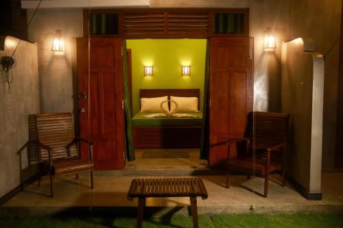 Postel nebo postele na pokoji v ubytování Colours Beach