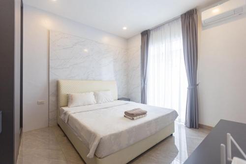 Postel nebo postele na pokoji v ubytování 5 Bed B42 - 1