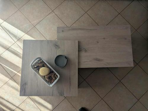 an overhead view of a bowl of nuts and an egg at Byron suite in Kavala