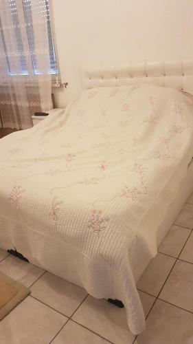 Ένα ή περισσότερα κρεβάτια σε δωμάτιο στο Chambres chez l habitant