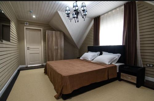 Ένα ή περισσότερα κρεβάτια σε δωμάτιο στο Jansaya Resort база отдыха Жансая