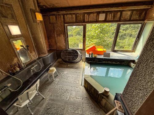 an overhead view of a swimming pool in a house at LiVEMAX Resort Nasu Kogen in Nasu