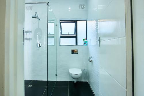 Et badeværelse på The Mendel Boutique Residence