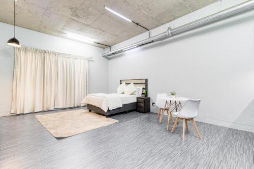 Postel nebo postele na pokoji v ubytování Escape to El&M