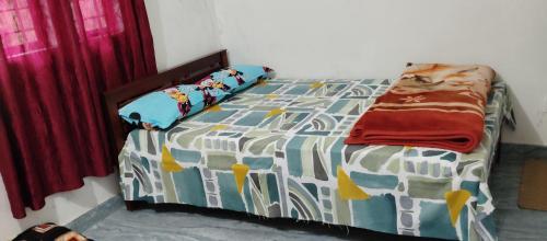 Giường trong phòng chung tại Misty plaza