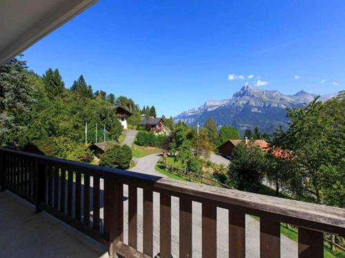 a balcony with a view of a mountain at Résidence & Spa La Grande Cordée - Combloux in Combloux