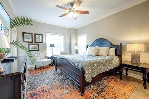a bedroom with a bed and a ceiling fan at 307 Main Sail in Hilton Head Island