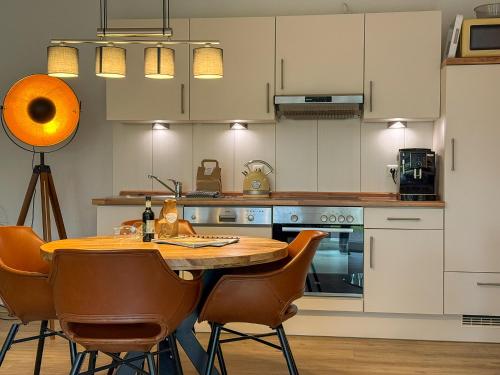 Η κουζίνα ή μικρή κουζίνα στο Dat Ferienhus Norddeich Ferienwohnung 7