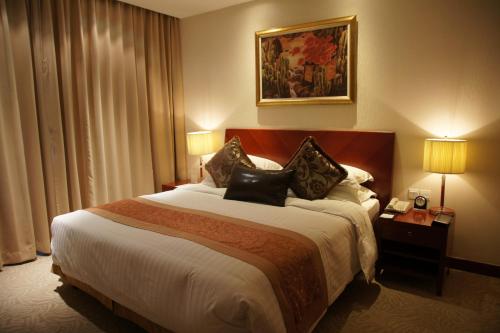 
Cama o camas de una habitación en Kingswell Hotel Tongji
