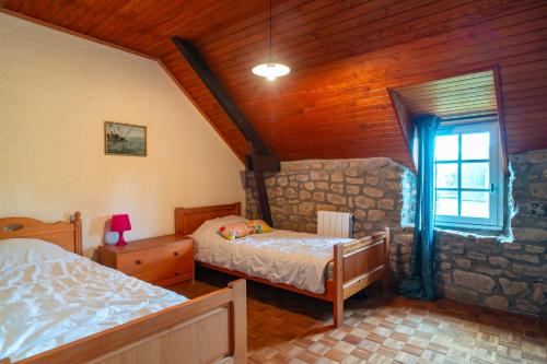 Ένα ή περισσότερα κρεβάτια σε δωμάτιο στο Ty Océane 1 - 5min du Port d'Etel