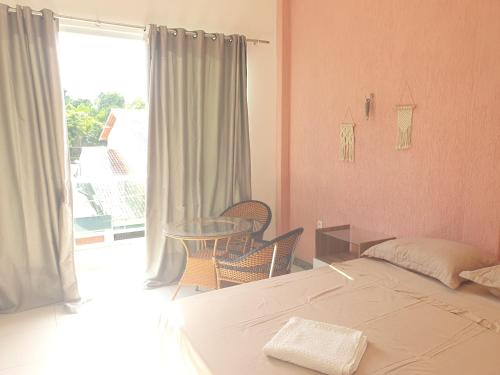 Ένα ή περισσότερα κρεβάτια σε δωμάτιο στο Accommodation for COP 30 Furnished Room 4 km from the COP 30 Venue