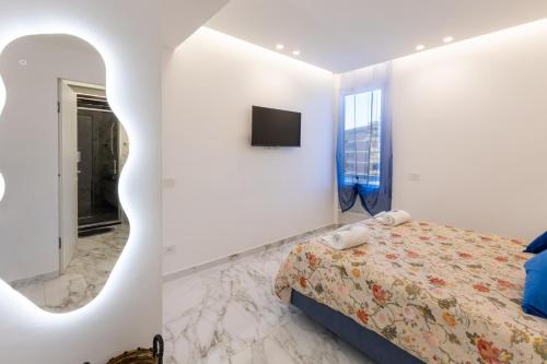 Ένα ή περισσότερα κρεβάτια σε δωμάτιο στο Luxury Oasis Penthouse in Florence Center