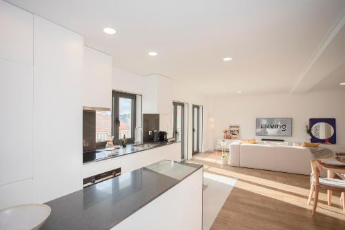 Kuchyň nebo kuchyňský kout v ubytování Liiiving in Gaia - Cooper Residence Apartment I