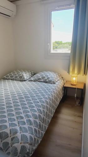En eller flere senge i et værelse på appartement t2