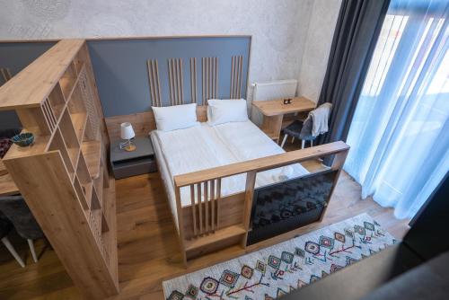 Postel nebo postele na pokoji v ubytování Mountain Magic Bjelašnica