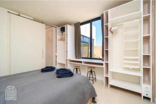 Giường trong phòng chung tại Good Times Sagres