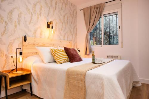 Postel nebo postele na pokoji v ubytování Alojamiento El Mirador del Castillo