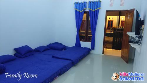 Kuchyň nebo kuchyňský kout v ubytování Villa Mutiara Sawarna