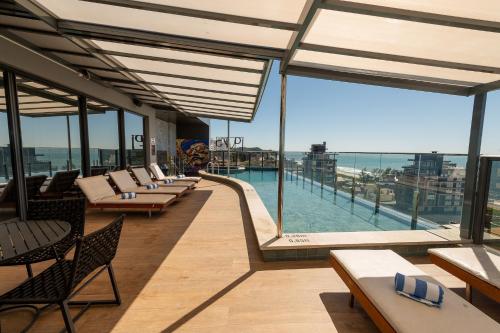 Бассейн в Brava Mundo Hotel Boutique OFICIAL или поблизости