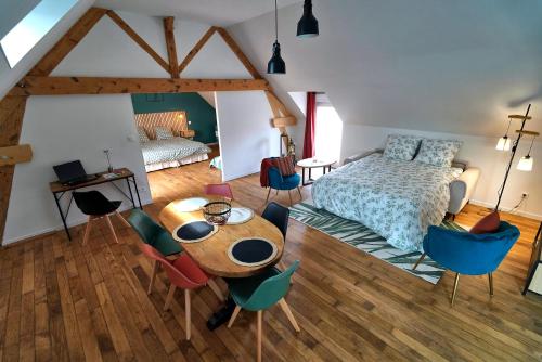 En eller flere senge i et værelse på Les clés du matz