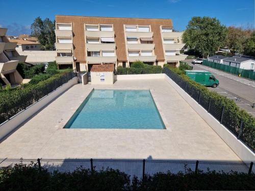 Appartement 2 pièces avec piscine, parking privé et accès direct à la plage - FR-1-387-50