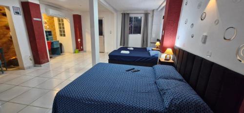 Ένα ή περισσότερα κρεβάτια σε δωμάτιο στο Suíte espaçosa na zona hoteleira da COP 30