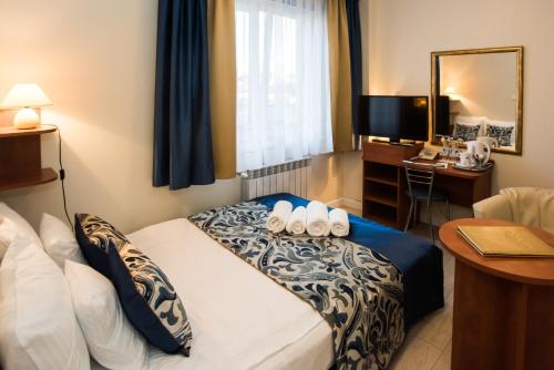 Postel nebo postele na pokoji v ubytování Abidar Hotel Spa & Wellness