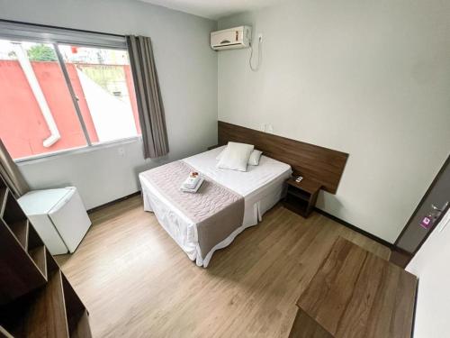 Postel nebo postele na pokoji v ubytování Hotel Zata - Econômico