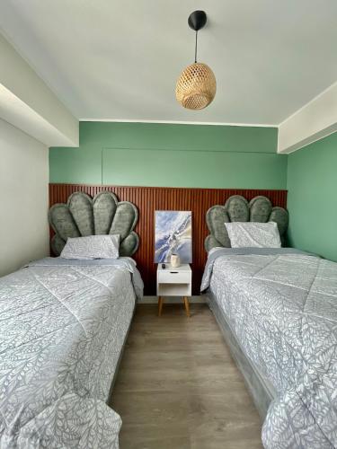 Katil atau katil-katil dalam bilik di LimaeStays Exclusive penthouse in downtown Barranco