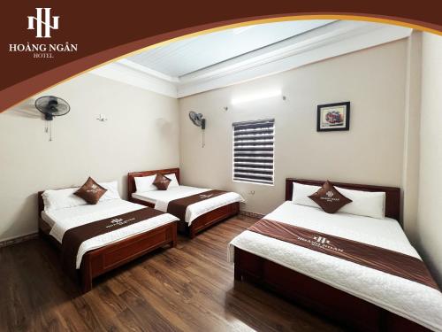 Letto o letti in una camera di Khách sạn Hoàng Ngân