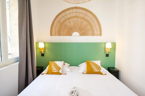 Postel nebo postele na pokoji v ubytování Le Chenavard III-coeur Lyon-Central air conditioning