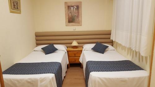 Hotel Cuatro Cañosにあるベッド