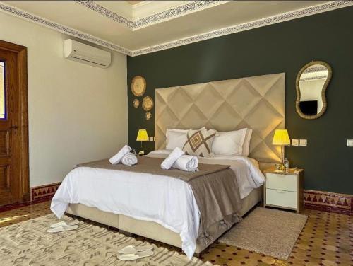 Postel nebo postele na pokoji v ubytování Complexe villa and Restaurant