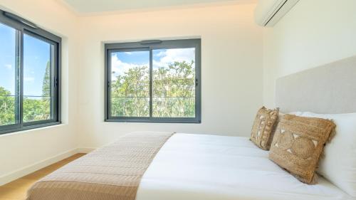 Acqua Sensation Suites by LovelyStay