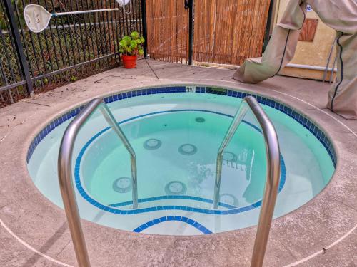 a small swimming pool with a slide in a backyard at Pacific Plaza #308 - Lazy Dune - 1BdrmUp-K-QSofa in Oceano