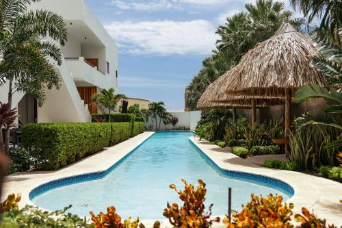 Aqua Zensa, luxe appartement 2 min van Mambo Beach