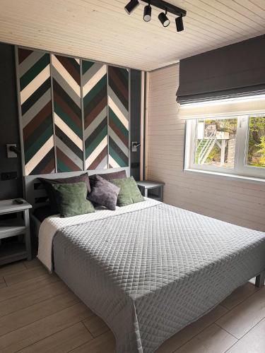 En eller flere senge i et værelse på Barn house 4 СЕЗОНИ