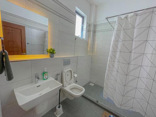 Koupelna v ubytování Blue Horizon Beachfront Apartments