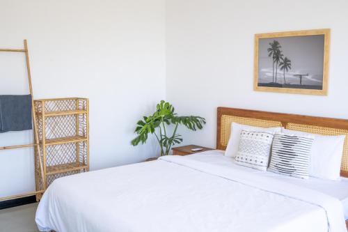 Postel nebo postele na pokoji v ubytování Sansun Guesthouse