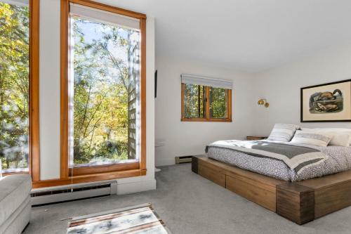 Ένα ή περισσότερα κρεβάτια σε δωμάτιο στο RMR: Yarrow 2311 Condo in The AspensWilson WY