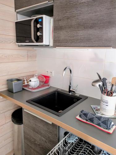 Kuchyň nebo kuchyňský kout v ubytování Cosy Suite chalet