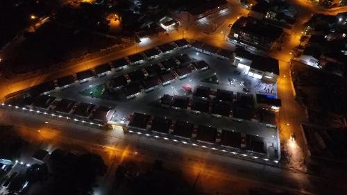 an aerial view of a parking lot at night at Indico Apart Hotel in Cidade de Nacala