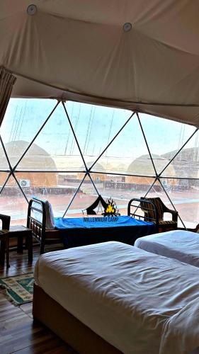 millennium camp में एक कमरे में एक या कई बेड