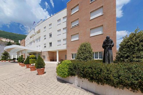 
The facade or entrance of Hotel Centro Di Spiritualità Padre Pio
