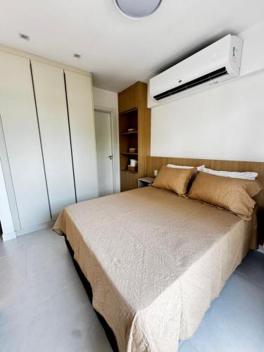 Llit o llits en una habitació de Studio Premium Batista Campos
