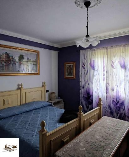 Postel nebo postele na pokoji v ubytování Torricella Hosting