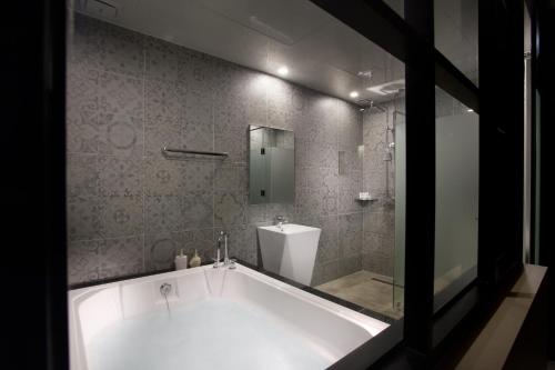 Un baño de Hotel Sienna