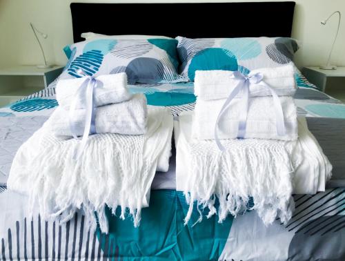 Postel nebo postele na pokoji v ubytování Alba sui Sassi